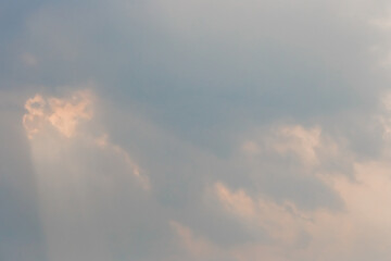 Naklejka na ściany i meble Soft airy warm yellow sunlight clouds sky blue evening natural background