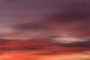Fototapeta premium Bright red-orange sunset sky clouds summer background nature evening beautiful landscape colorful