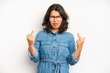 hispanic pretty woman feeling provocative, aggressive and obscene, flipping the middle finger, with...