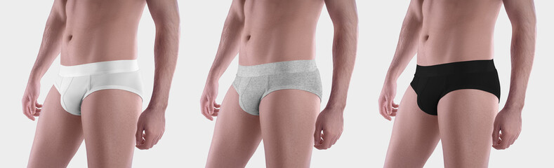 Mockup of men's white, black, heather panties, briefs with a wide elastic band, isolated on a background, front, side view.