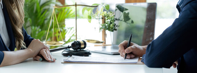 Businessman and lawyer discuss the contract document. Treaty of the law. Sign a contract business.