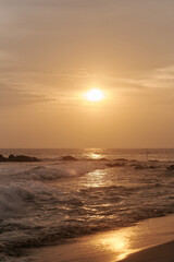 Ocean waves at sunset in Sri Lanka