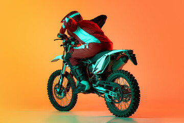 Portrait of young man, biker in full equipments riding motorbike isolated over orange studio background in neon light. Growing speed