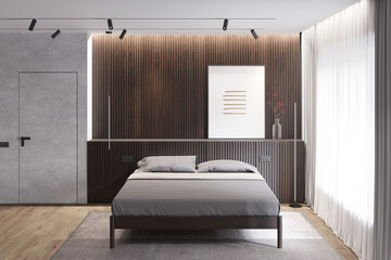 A dark minimalist bedroom with a vertical poster on a wooden headboard with gray bedding, a floor...