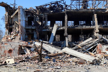 Ruined house Ukraine. Destroyed and burnt civilian building after rocket attack of Russian in...