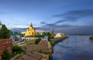 Panoramic view of the Volga River and the cathedral in the name of the holy prince Alexander Nevsky in the evening. Nizhny Novgorod, Russia. - obrazy, fototapety, plakaty