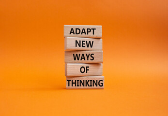 Adapt new ways of thinking symbol. Wooden blocks with words Adapt new ways of thinking. Beautiful...