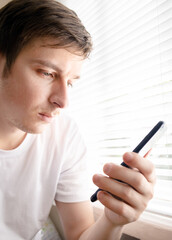 Young Man with a Phone