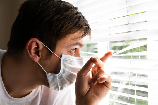Young Man in the Surgical Mask