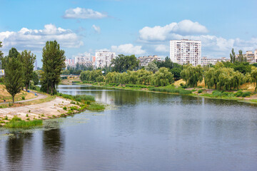 Embankment of the Rusanivka district in Kyiv on a summer day.