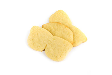 Three unfrosted sunglasses sugar cookies stacked isolated over white