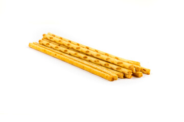 Yellow corn snack sticks side view isolated over white