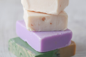Homemade natural soap bar on black background 