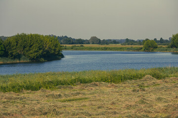hay field near Lielupe river in Latvia
