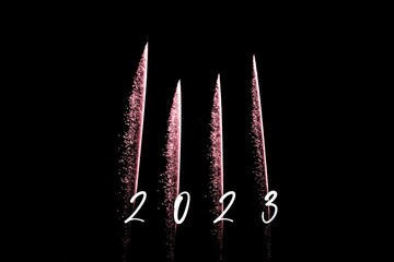 Happy new year 2023 red fireworks rockets new years eve. Luxury firework event sky show turn of the year celebration. Holidays season party time. Premium entertainment nightlife background