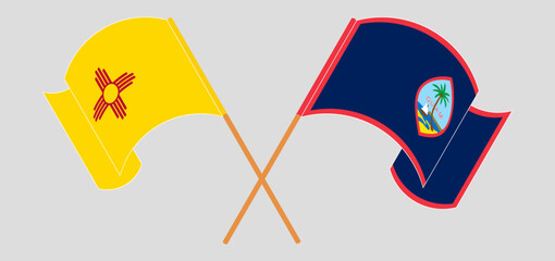Crossed and waving flags of the State of New Mexico and Guam
