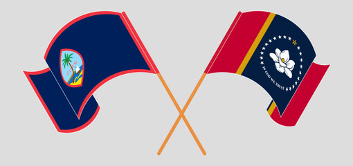 Crossed and waving flags of Guam and The State of Mississippi