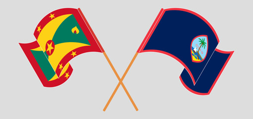 Crossed and waving flags of Grenada and Guam