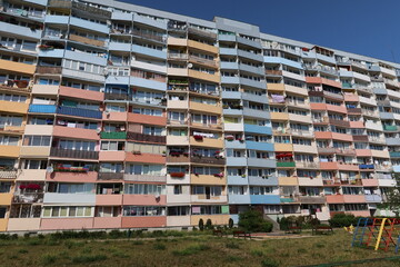 Soviet building with different color balconies 