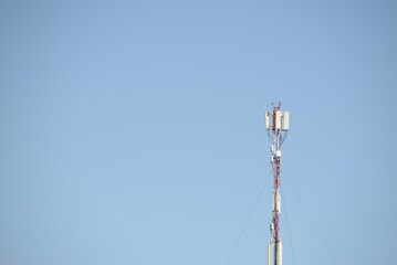 unfinished building against the background of the evening sky for banner, background, postcard, mail beautiful glass building, apartment building, cranes construction	
