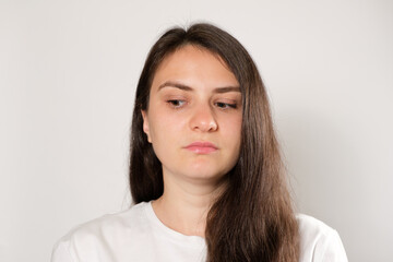 The woman looks sideways, does exercises for the eyes. Eye muscle training.