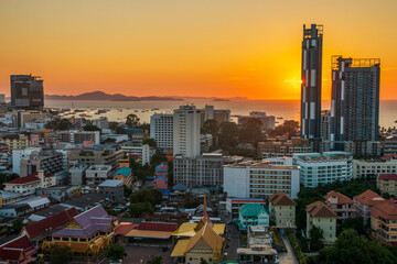Naklejka premium The Cityscape and the buildings of Pattaya District Chonburi Thailand Southeast Asia during the sunset time