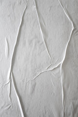 Blank white glued paper for poster texture overlay. Crumpled and wrinkled pattern for background....