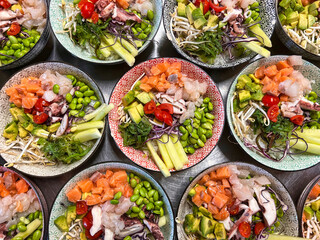poke bowl with rice vegetables and fresh fish