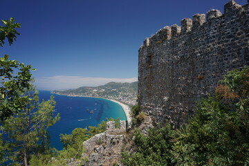 Fototapeta premium The walls of Alanya Castle and Cleopatra beach from the hill, Alanya Antalya Turkey