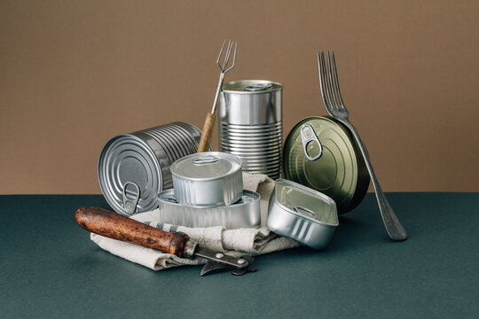 Set of stacked unopened cans