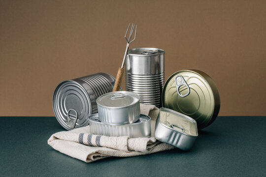 Set of stacked unopened cans