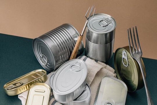Set of stacked unopened cans