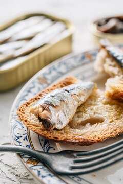 Closeup of a plate of bread with sardines