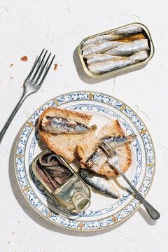 Closeup of a plate of bread with sardines