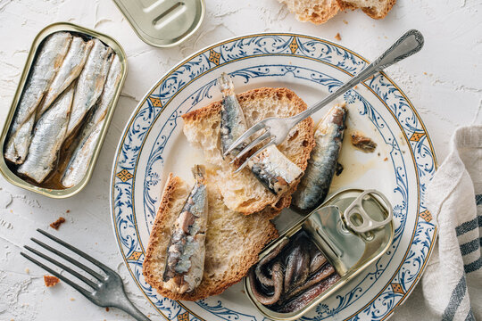 Closeup of a plate of bread with sardines