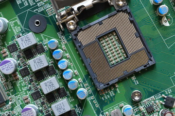 Detail of a CPU Socket on a Motherboard. Printed Circuit Board - Computer Motherboard with...
