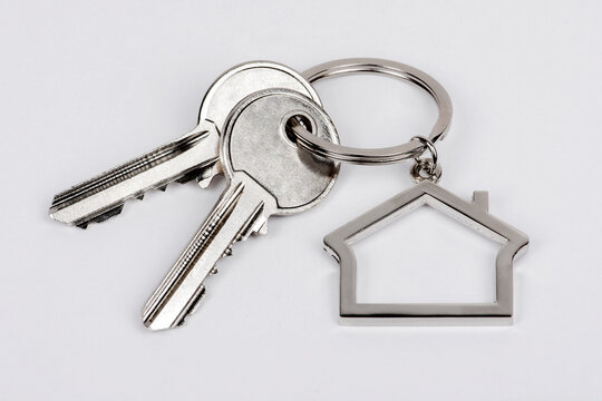 House shaped keychain with two keys