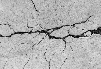 white concrete surface cracked pattern