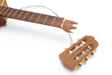 Classical acoustic guitar with broken headstock