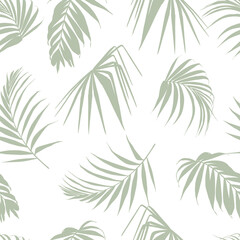 Fototapeta na wymiar Tropical exotic floral silhouette green palm leaves seamless pattern background. Exotic jungle wallpaper. 
