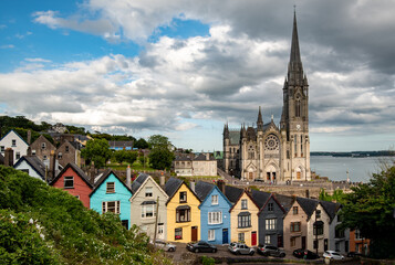 Fototapeta na wymiar Deck of cards houses and st colmans cathedral at Cobh city Ireland Europe