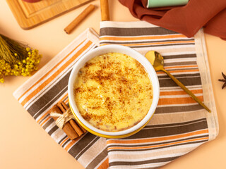 Sweet corn pudding with cinnamon sprinkled on top