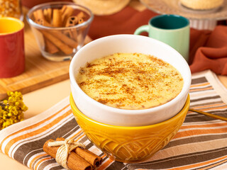 Sweet corn pudding with cinnamon sprinkled on top