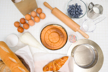 Baking or cooking ingredients composition on the kitchen table  background, coffee shop business concept
