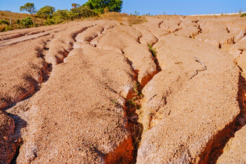 Linear erosion process by ravines on the Luziania-Coruma IV road edges, caused by terrain slope, high granulometry and  high soil erodibility, Goias, Brazil, July 2020