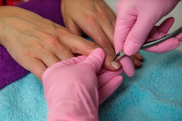 Manicure.Hands care` close up.Using tools.