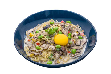 Runny Yolk Carbonara pasta served in a dish isolated on plain white background side view