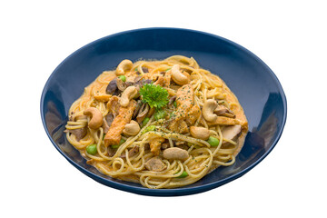 Tom Yum Cream pasta served in a dish isolated on plain white background side view