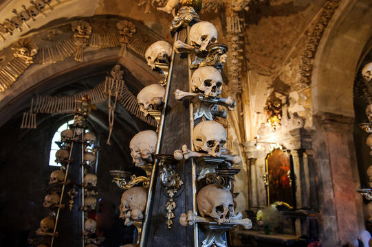 Kutna Hora, Czech Republic - May 1 2021: Structure of sculls and bones in Chapel of All Saints