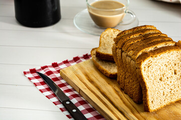 loaf bread or whole bread with natural fermentation, in a breakfast scene or afternoon coffee break